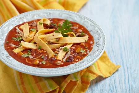 Mexican chicken soup with tortillas