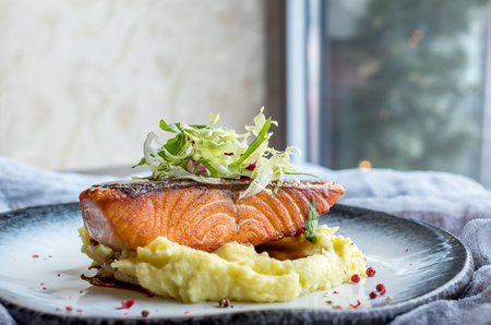 Cauliflower puree with salmon and asparagus